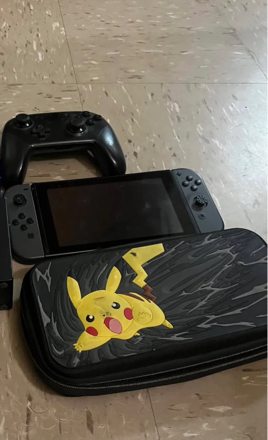 Nintendo Switch Console with Pro Controller and Pikachu Case