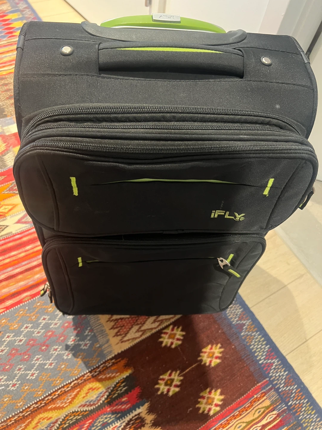 iFLY Black Rolling Carry On Suitcase