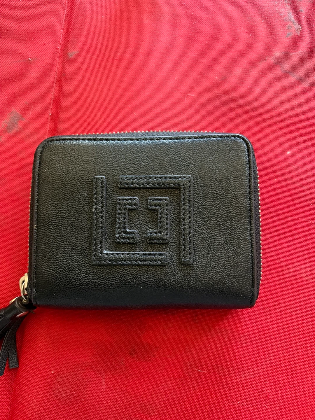 Black Bifold Wallet with Tassel Detail