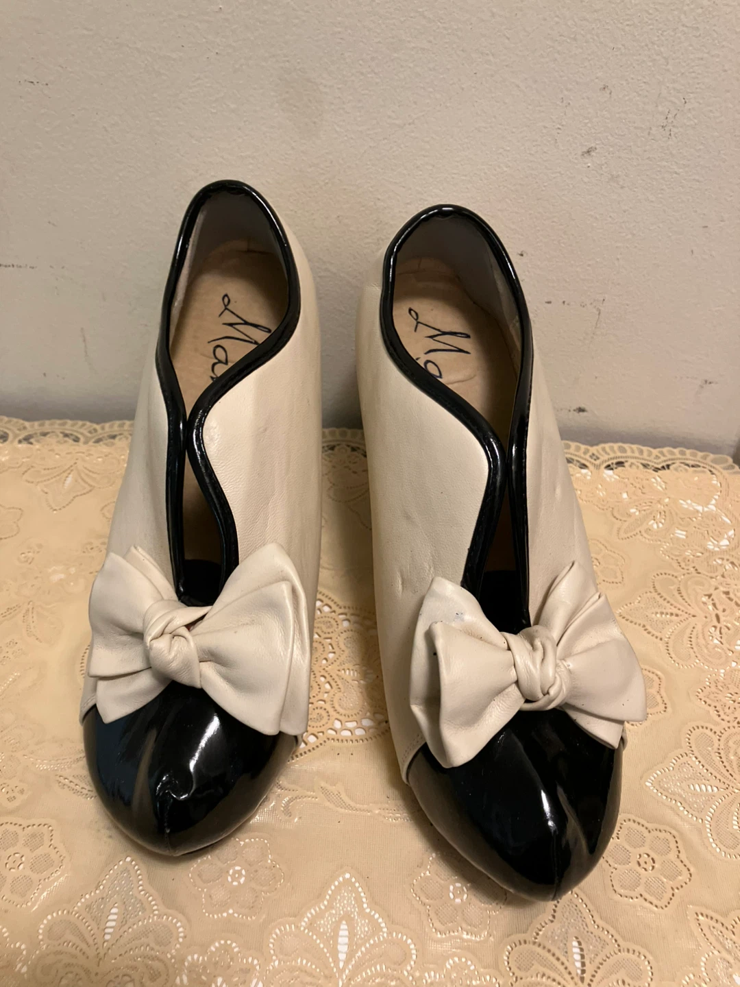 Cream and Black Cap Toe Bow Heels
