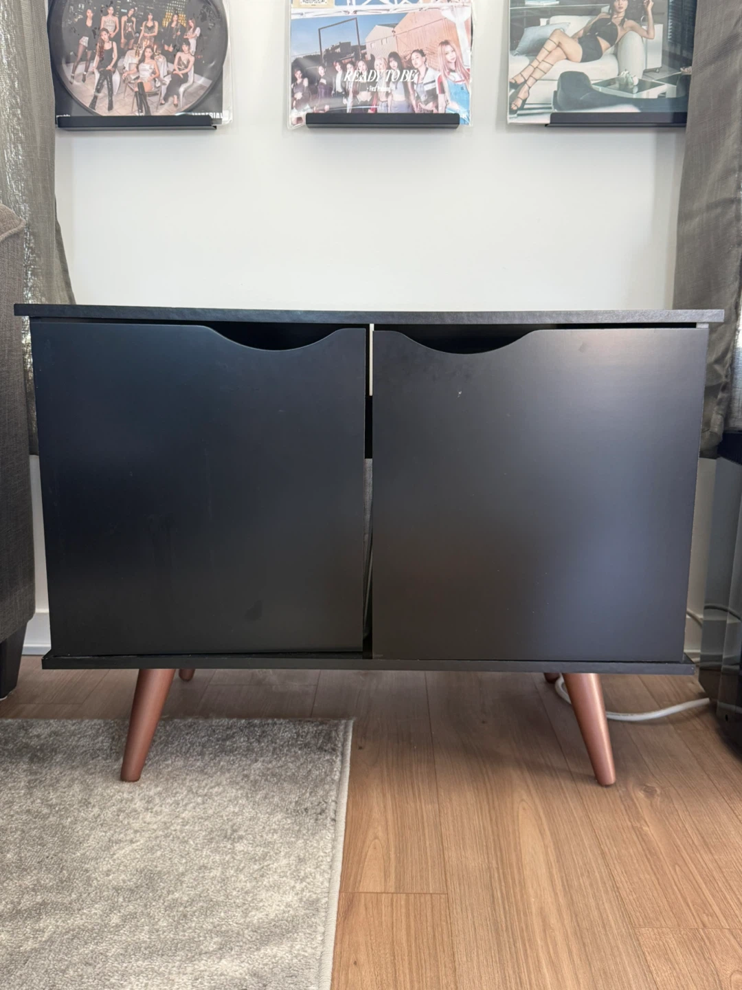 Black Two-Door Cabinet with Copper Legs