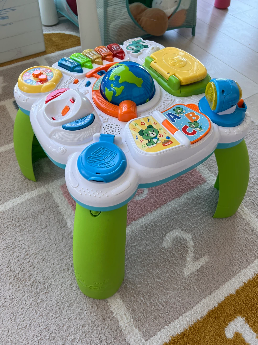 Multiple toys from LeapFrog, Fisher-Price and IKEA