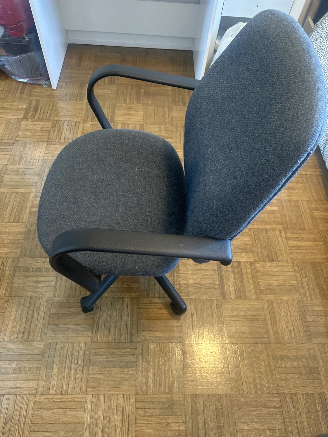Grey office chair with wheels