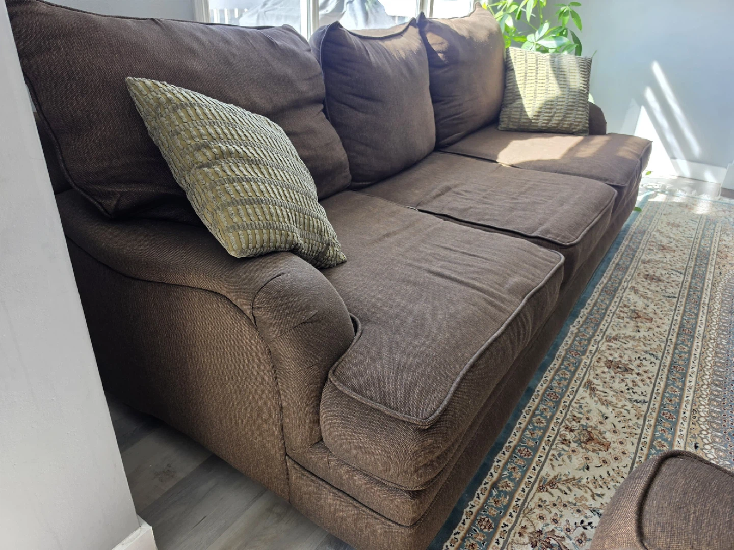 Brown Upholstered Sofa and Coffee Table