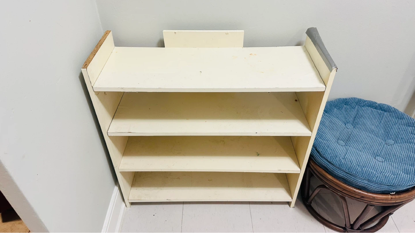 Cream coloured 4-shelf storage unit