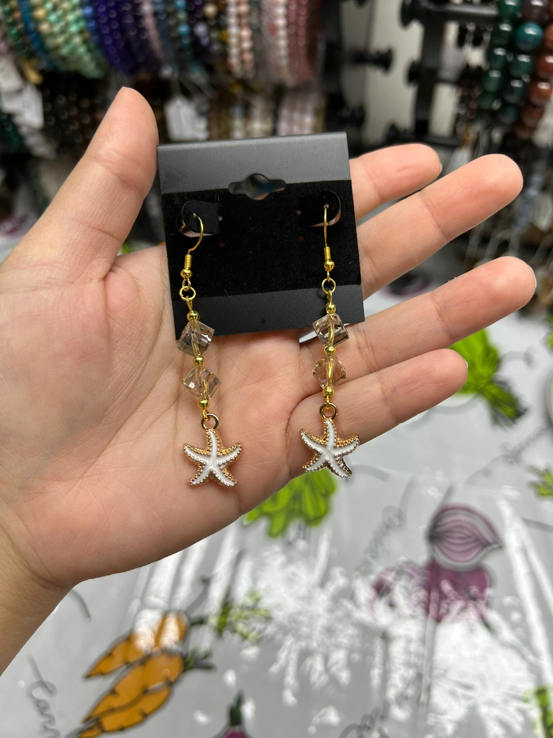 Gold Starfish Dangle Earrings with Crystals