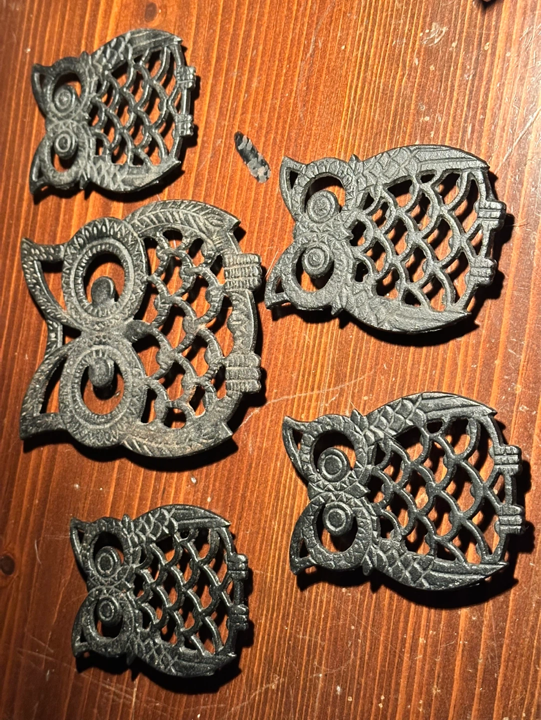 Set of 5 cast iron owl trivets