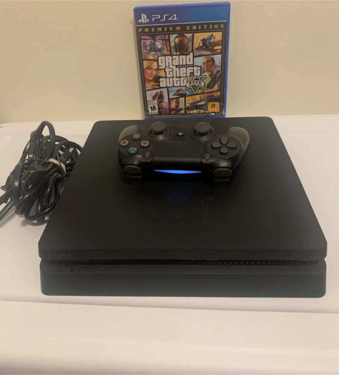 PlayStation 4 Slim Console with Grand Theft Auto V