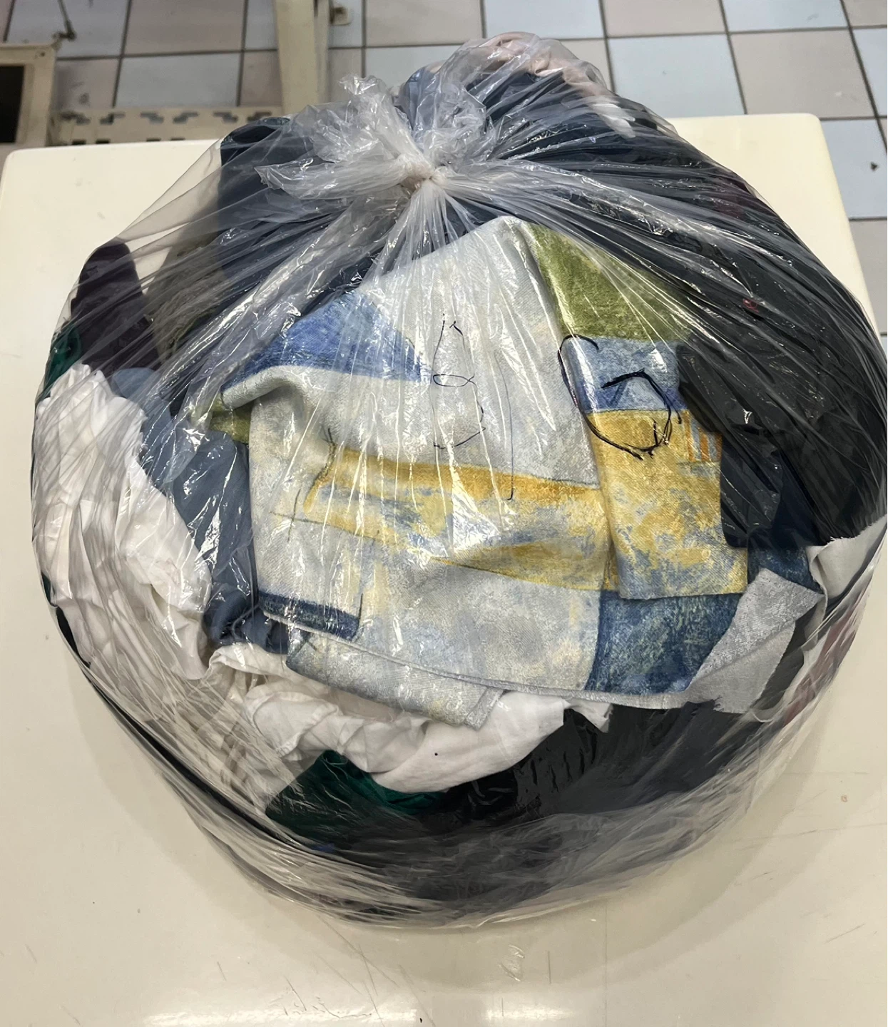 Bag of assorted clothing scraps