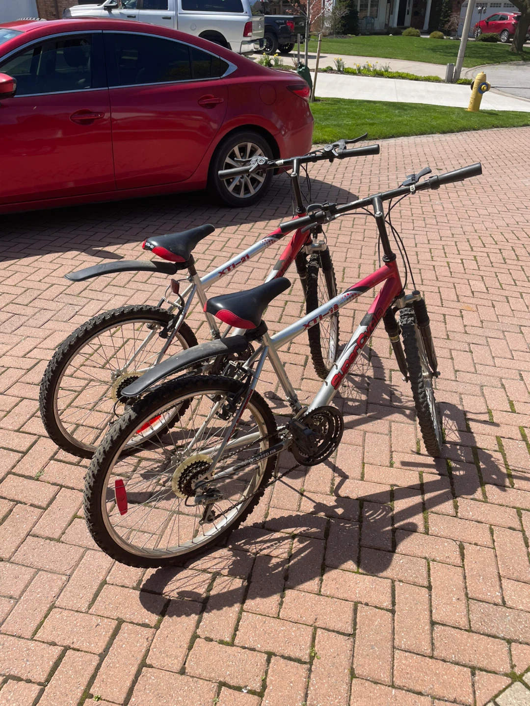 Two Mountain Bikes - Red and Silver
