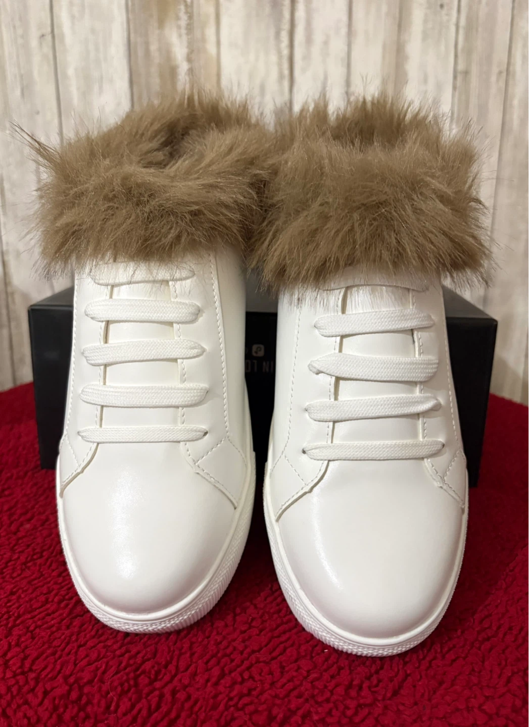 White fashion sneakers with fur trim