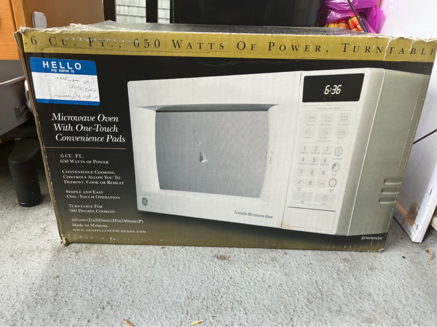 GE Microwave Oven with One-Touch Convenience Pads