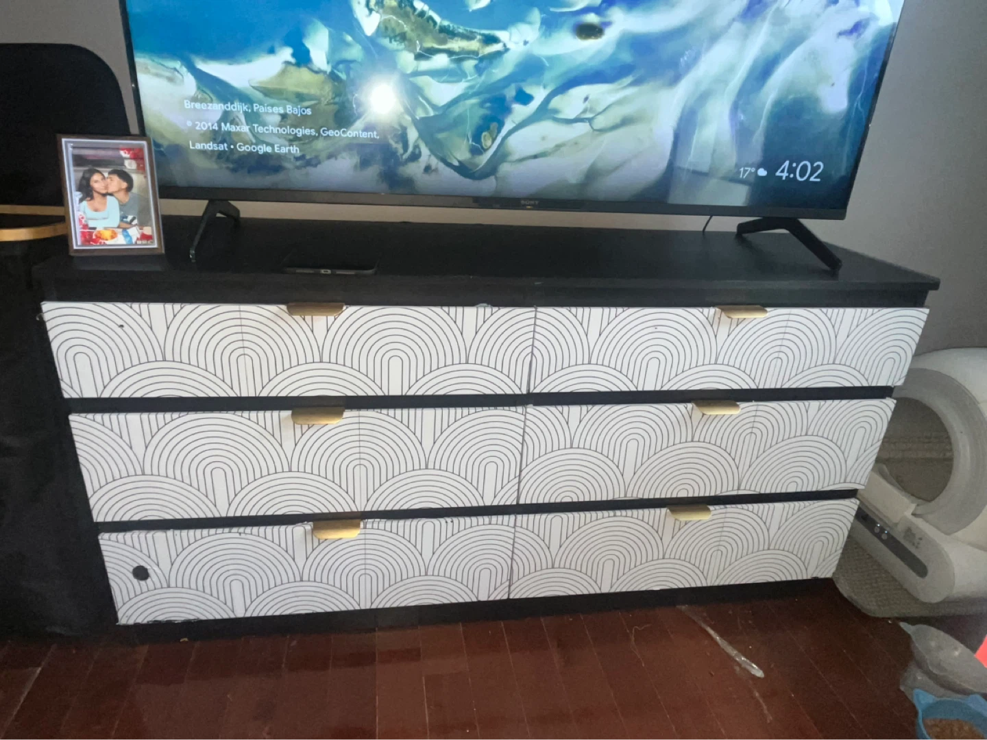 Black Dresser with Decorative Drawers