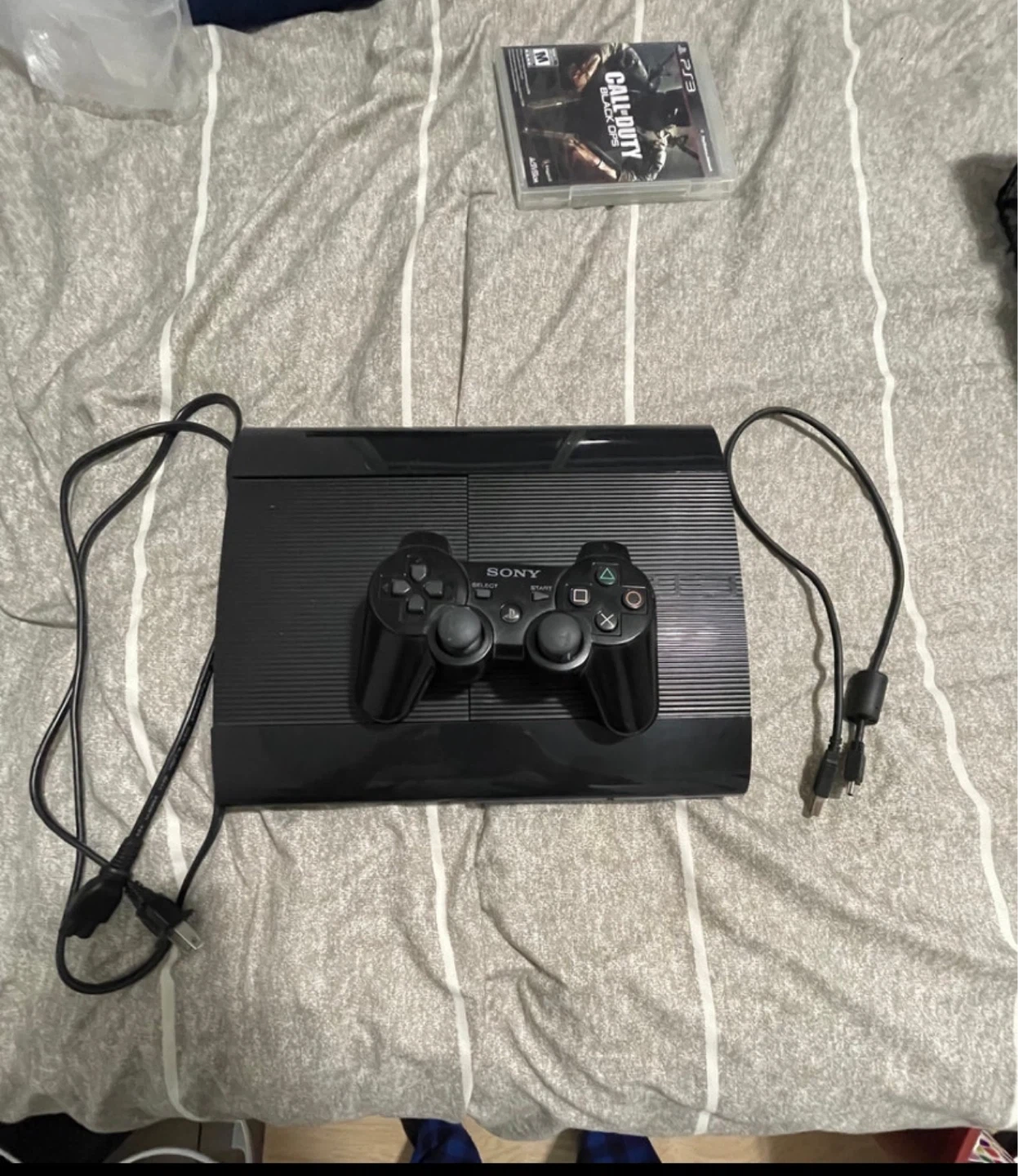 PlayStation 3 Console Bundle with 4 Games and Controller