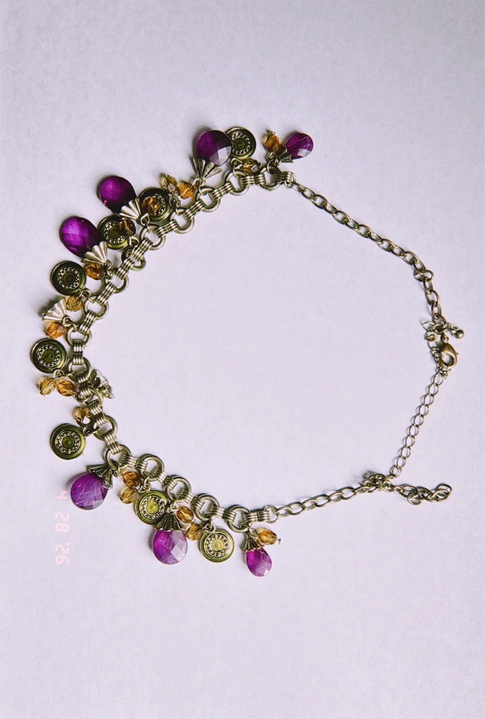 Purple and gold charm necklace