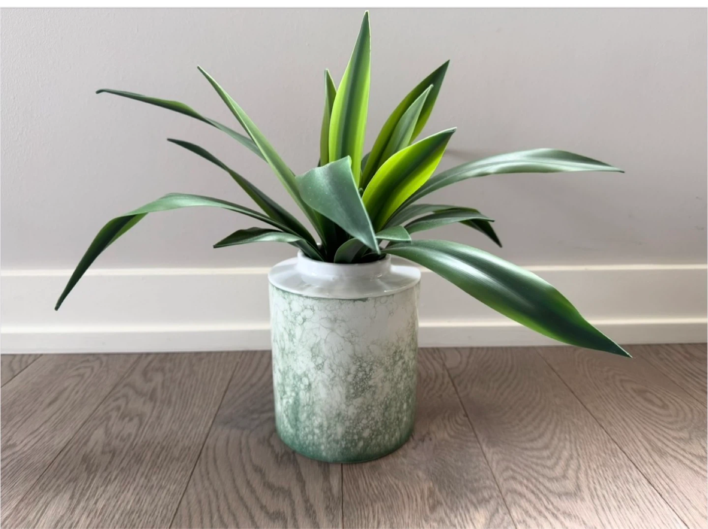 Artificial Green Plant in Textured Ceramic Pot