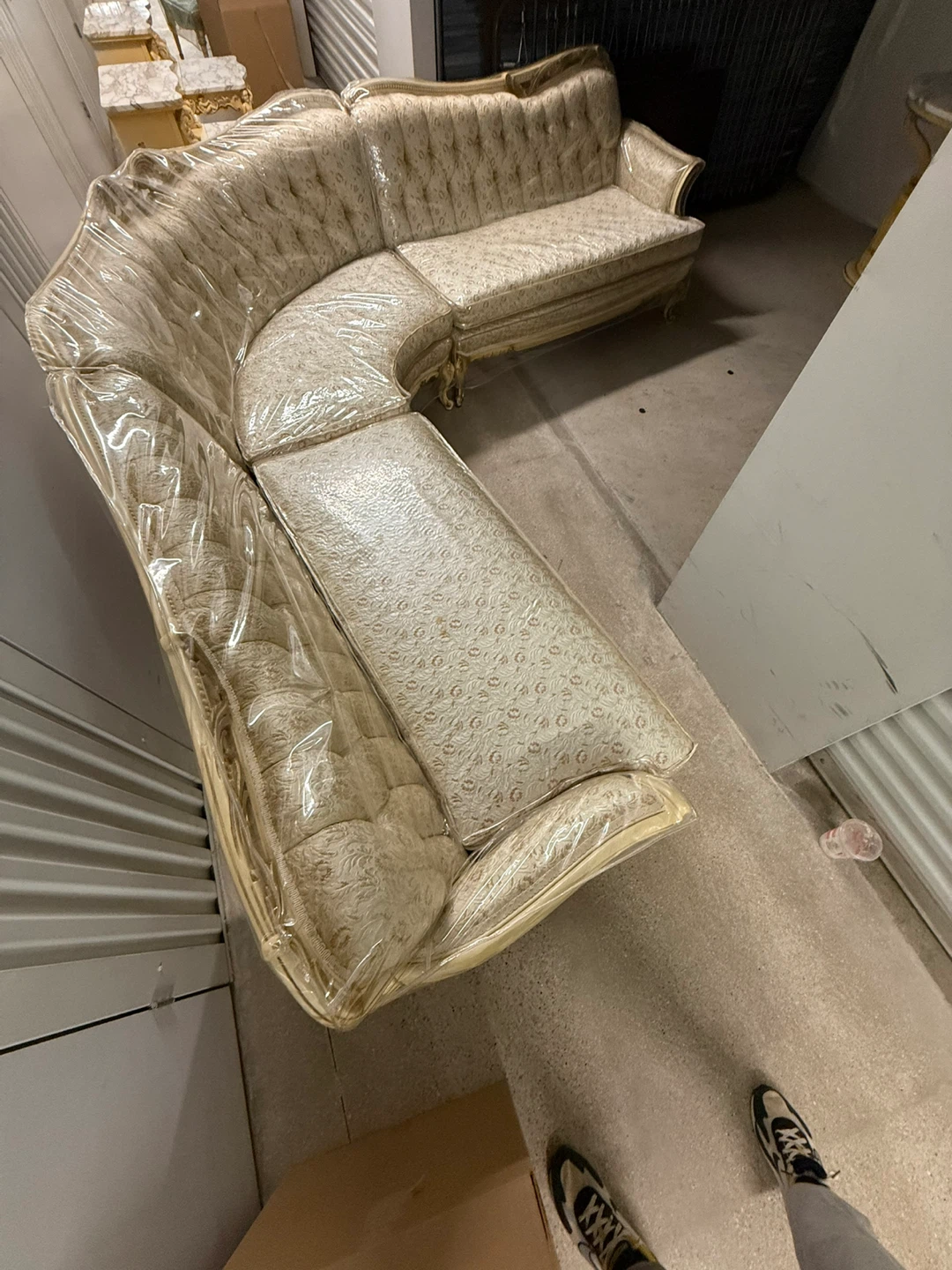Curved Tufted Sofa with Wood Trim