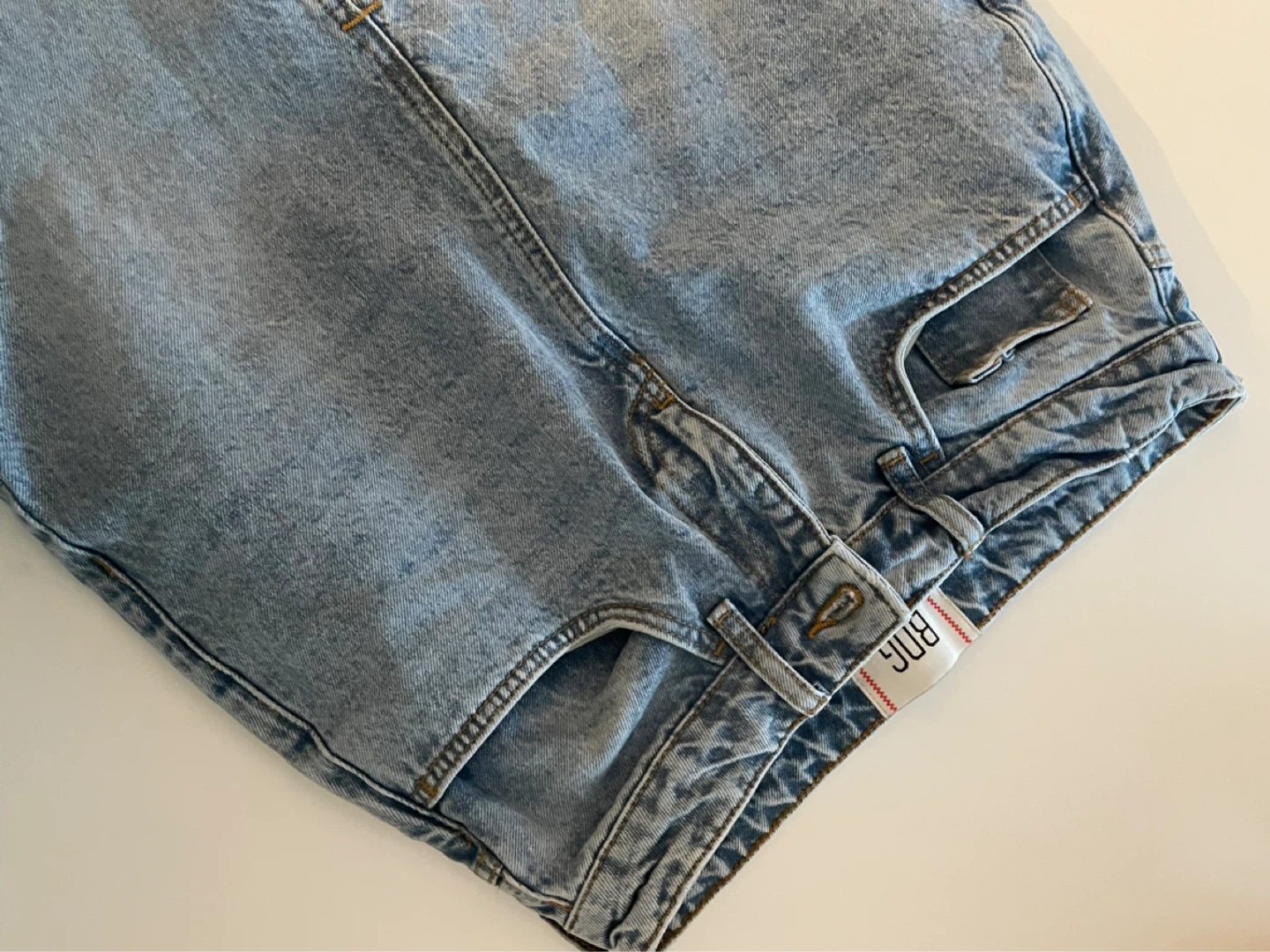 BDG Skrit and H&M black jeans and black tennis skrit