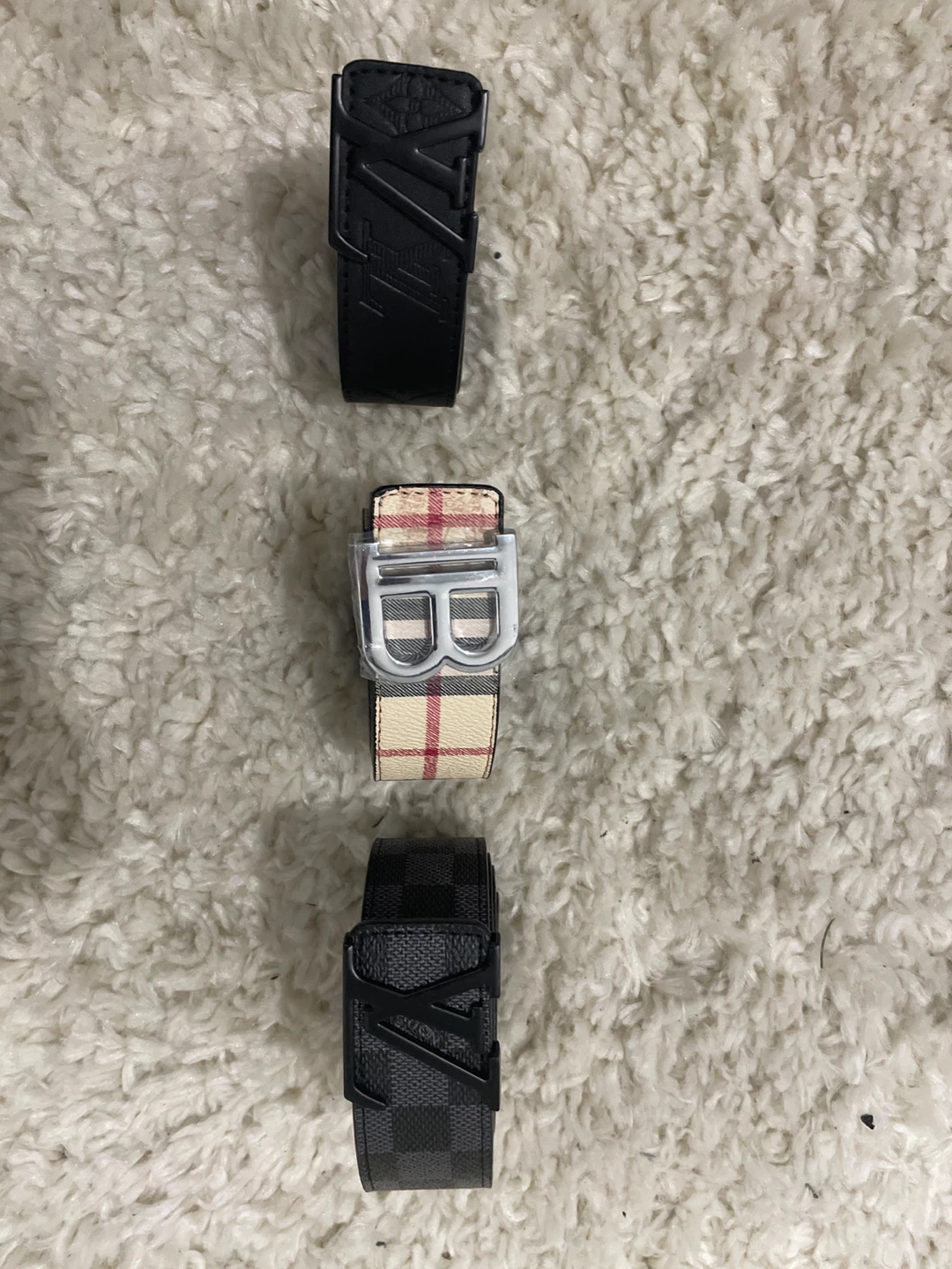 Lv belts and Burberry belt