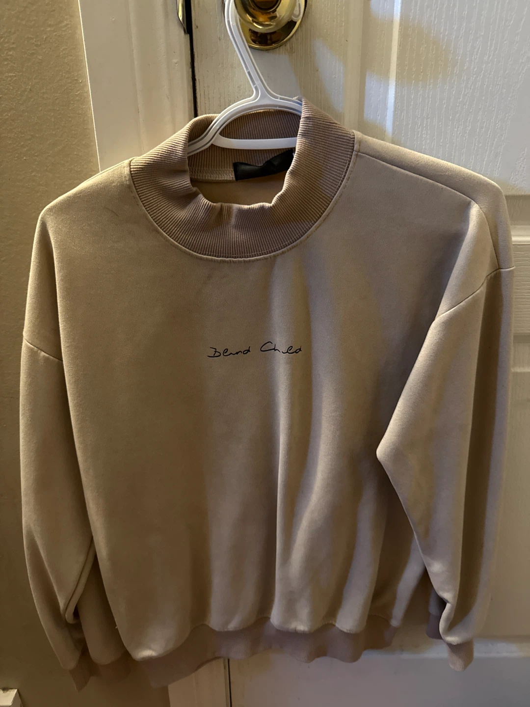 Blind Child Mock Neck Sweatshirt
