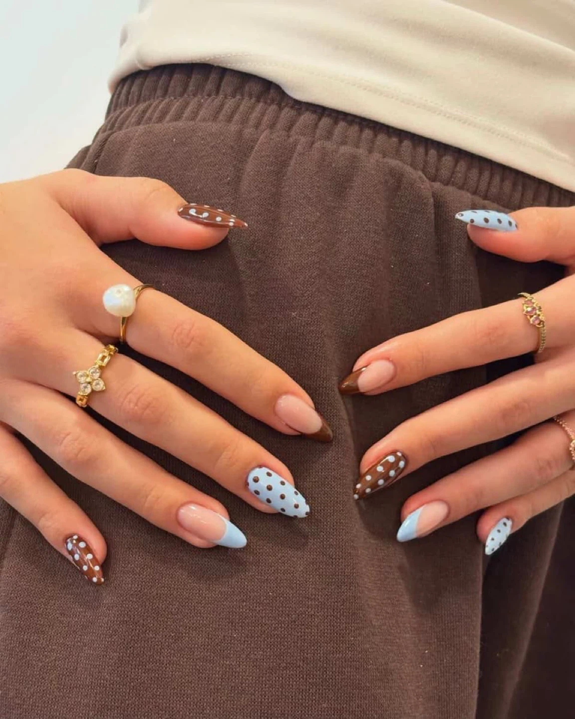 Custom French Tip Nails with Polka Dot Accents