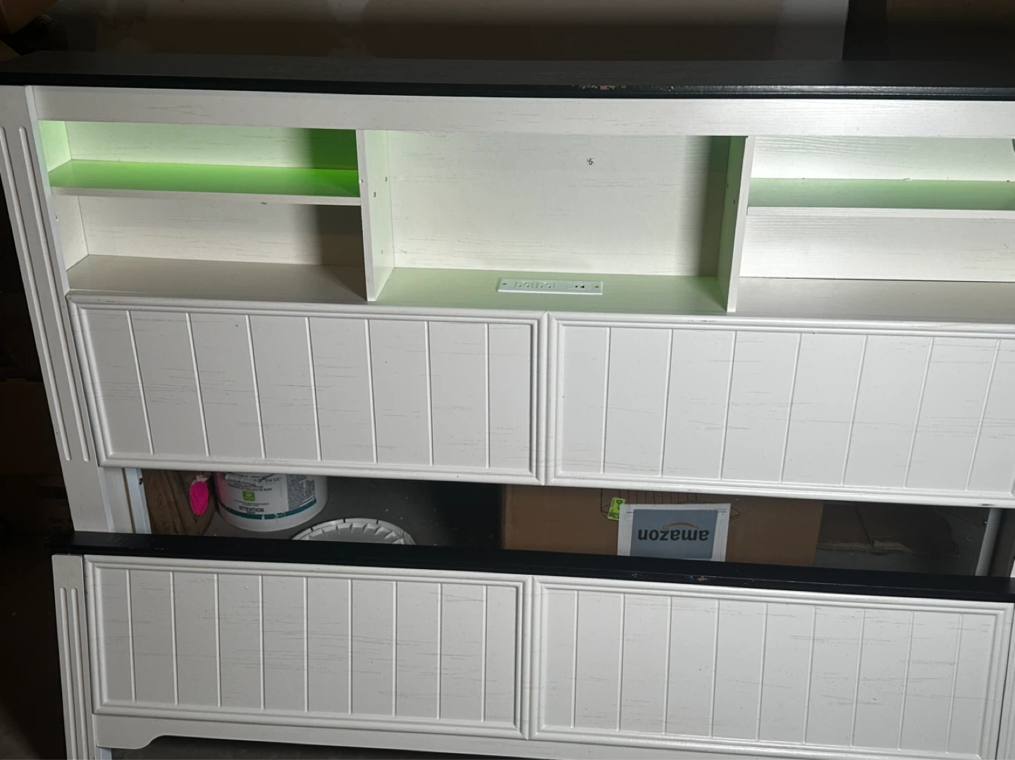White and black Queen bed dissasembled with Outlets
