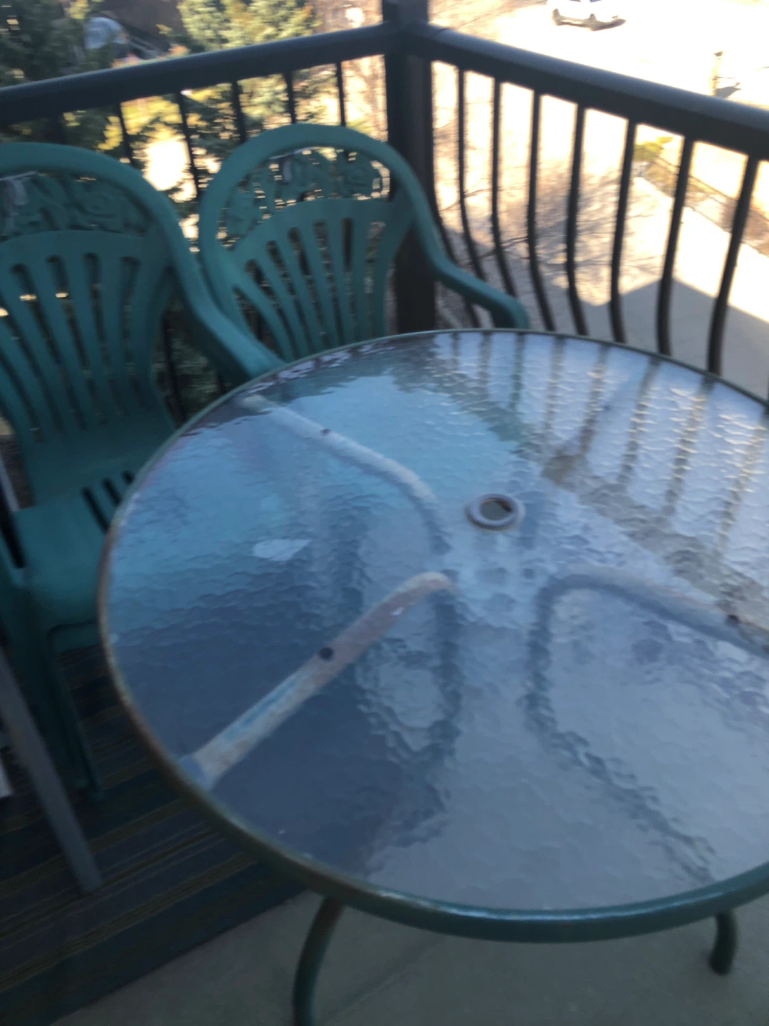 Green Plastic Patio Chairs ,and Glass Table
