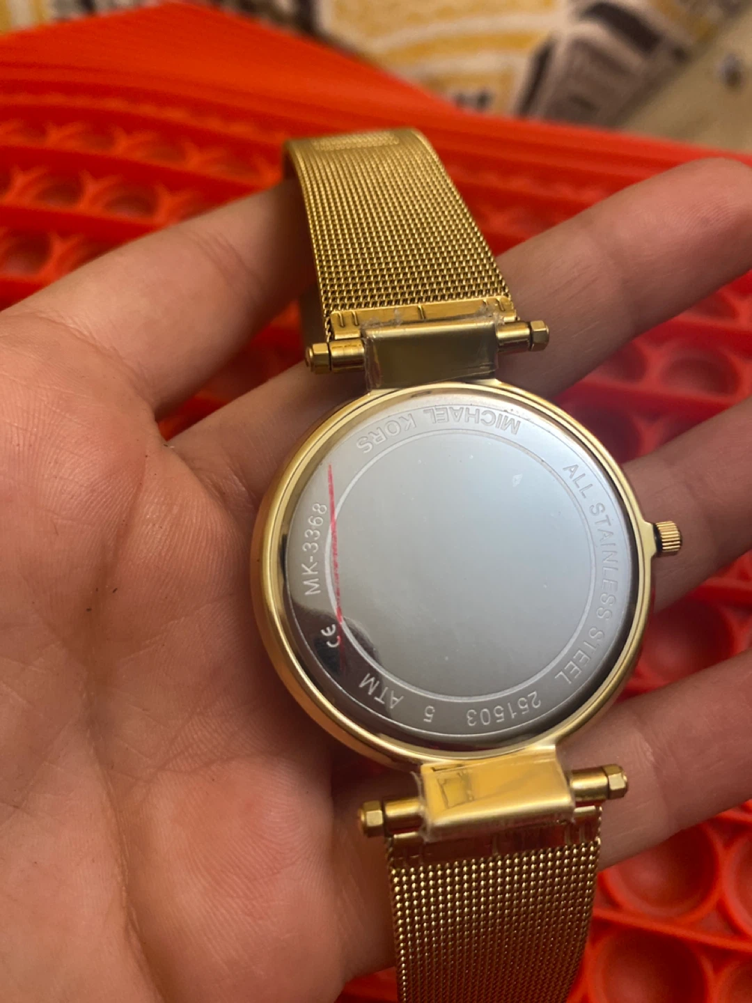 Michael Kors Gold Tone Watch with Crystal Bezel