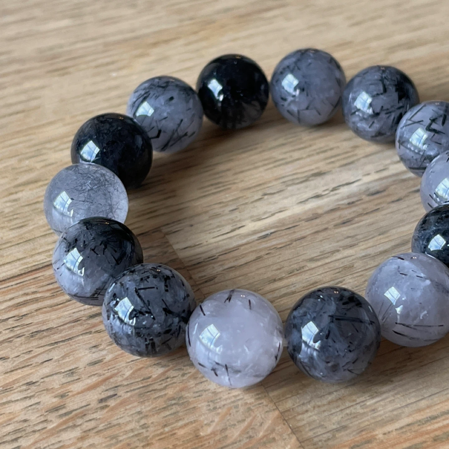 Tourmalinated quartz bracelet (14mm bead)