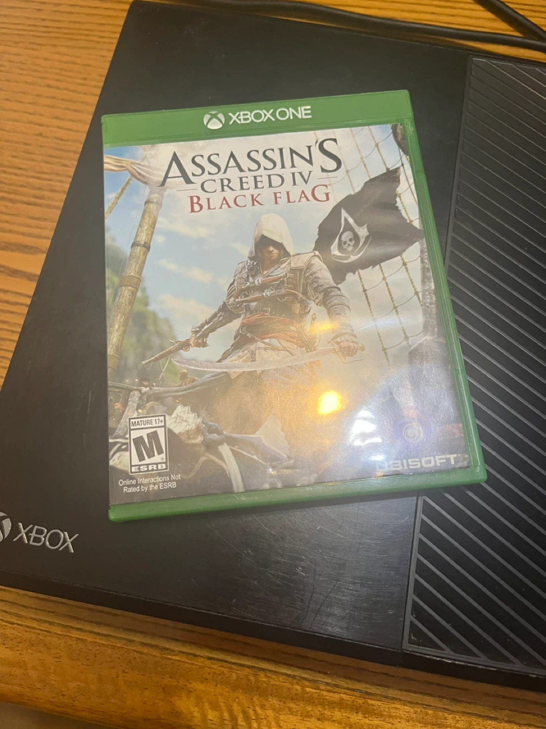 Xbox One Console with Assassin's Creed IV: Black Flag and LG TV