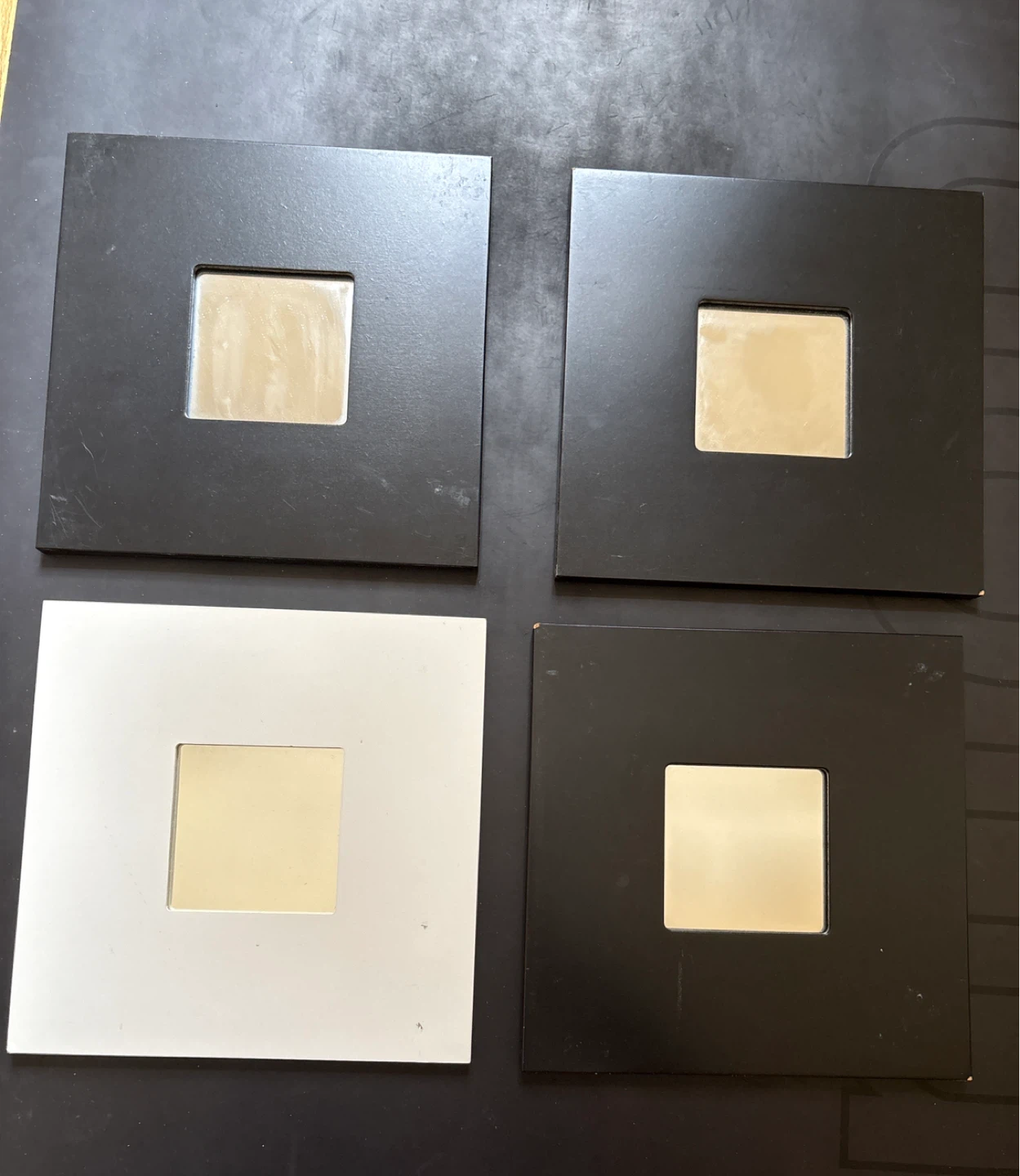 Four IKEA Malma mirror frames 10”x10”. 3 black 1 white