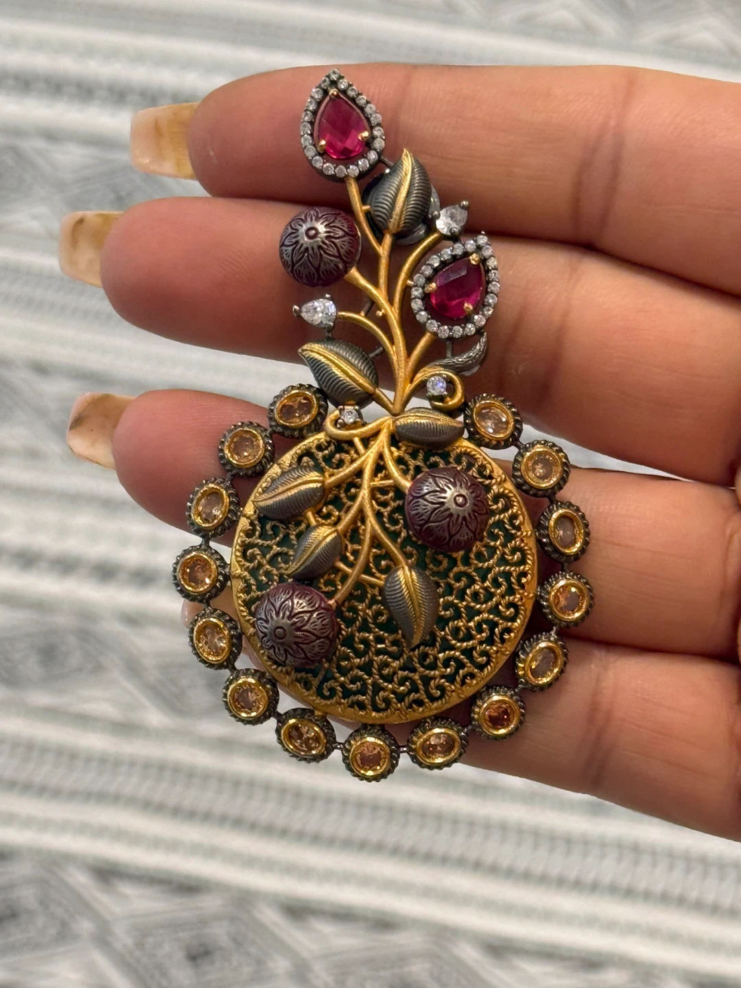 Ornate Gold-Tone Earrings with Red and Amber Stones