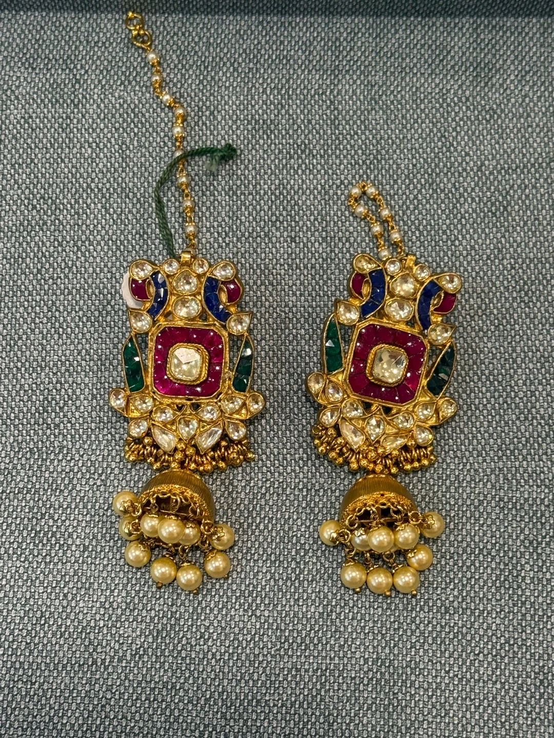 Gold Jhumka Earrings with Pearls and Red Stones