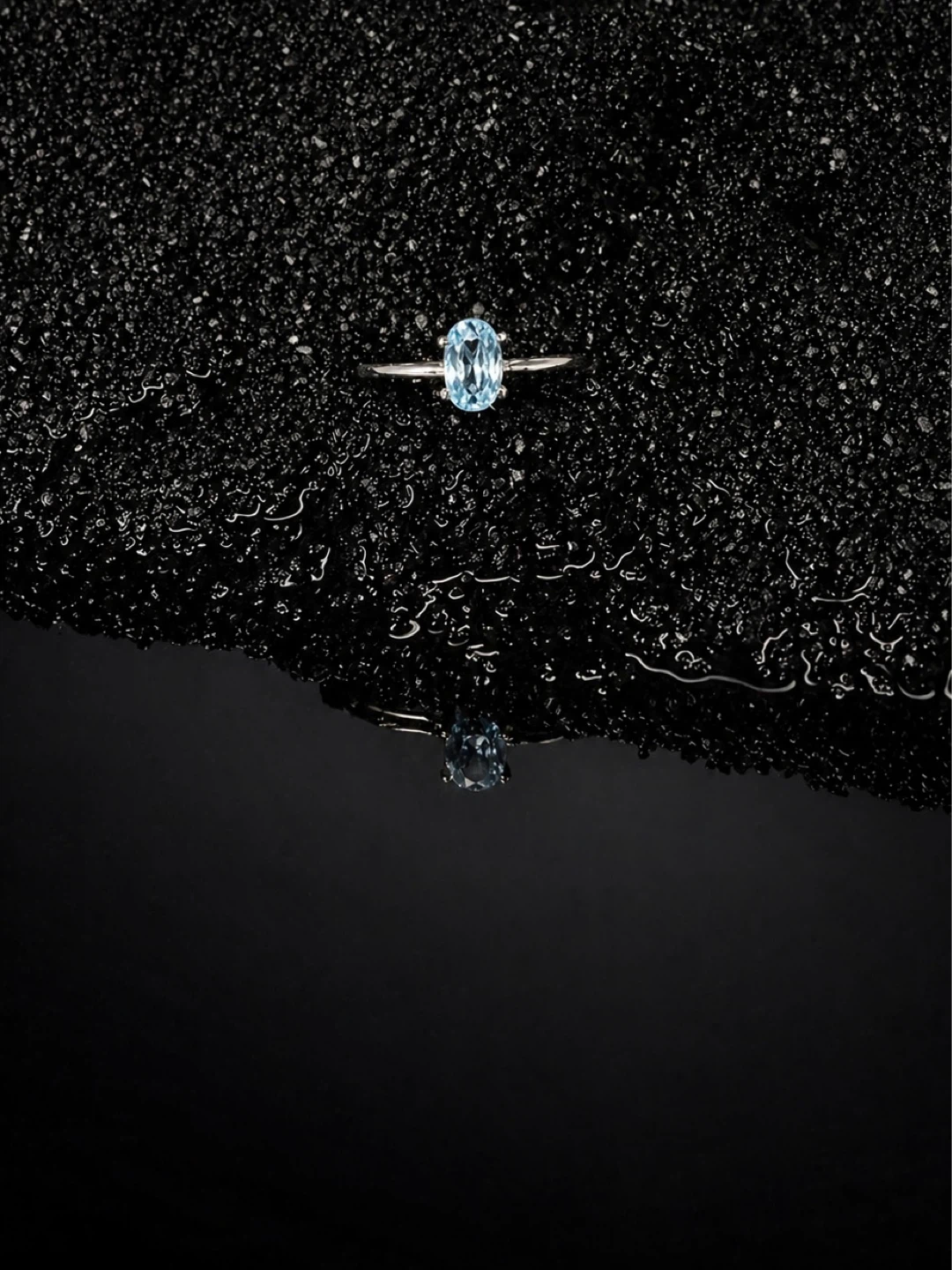 Dainty Oval Sky Blue Topaz Ring