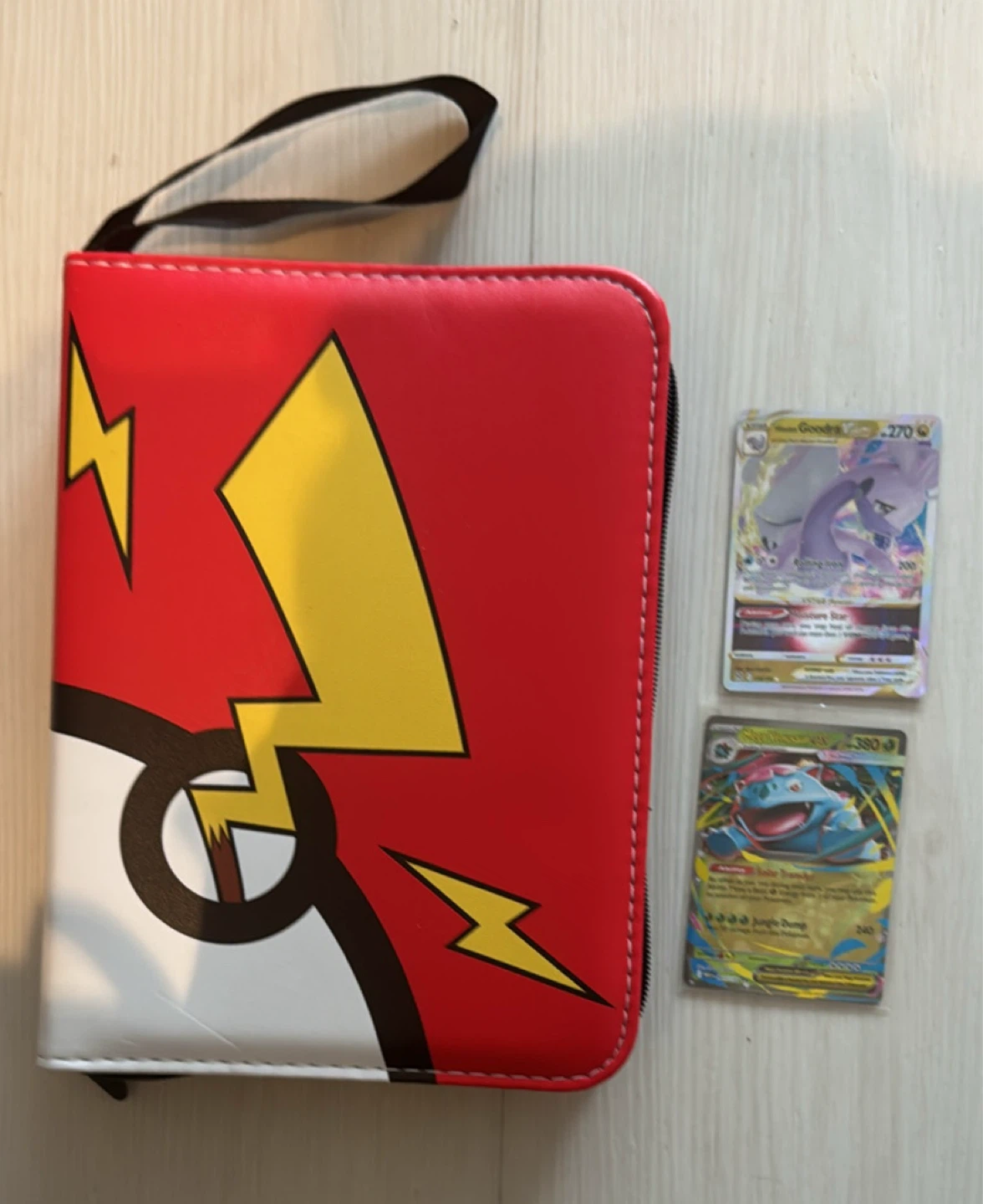 Filled Pokémon card binder