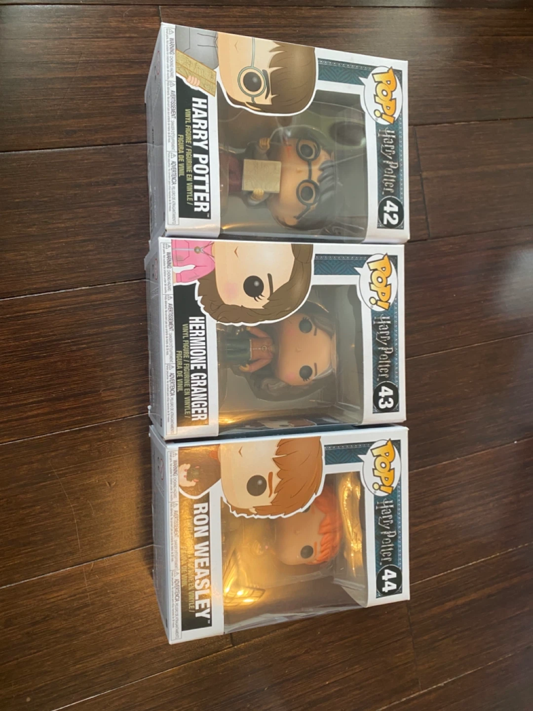 Funko Pop! Harry Potter, Hermione Granger, and Ron Weasley