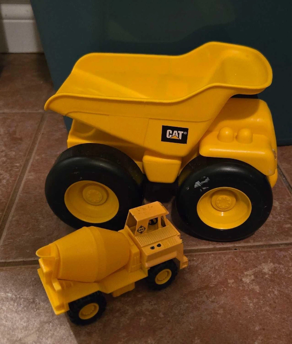 CAT yellow dump truck and cement mixer toy set