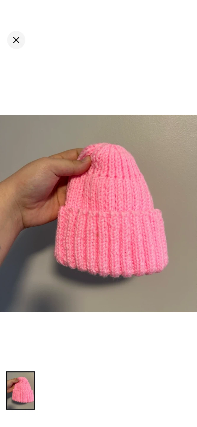 Hand-knitted pink ribbed beanie
