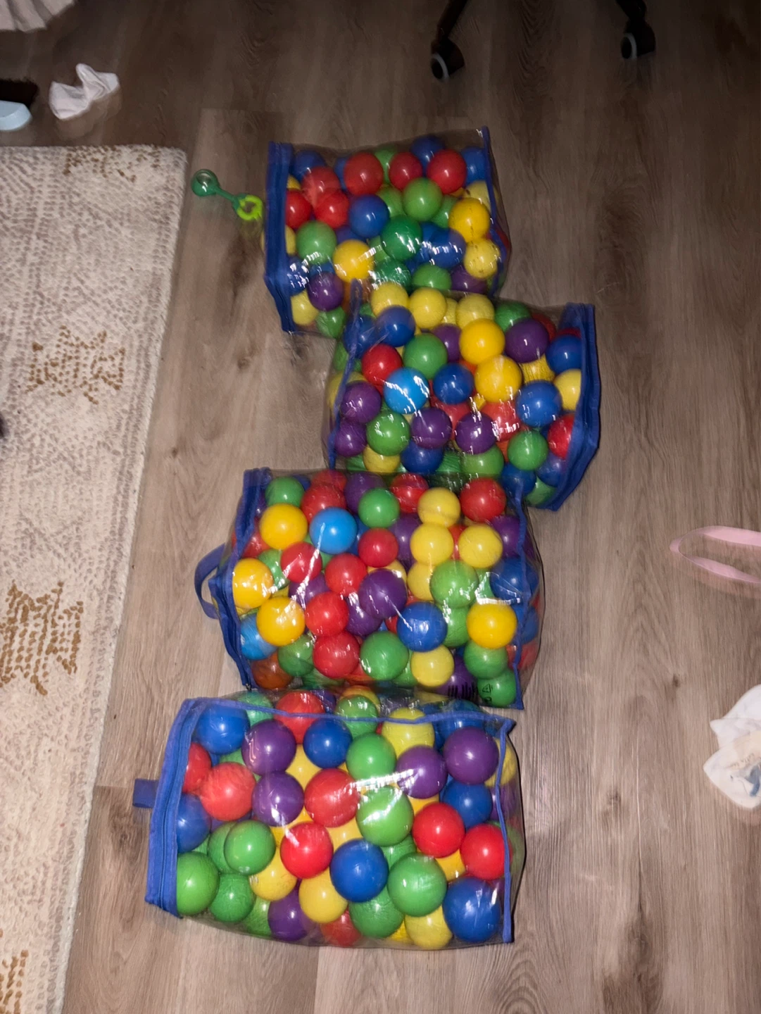 Bags of colourful plastic play balls