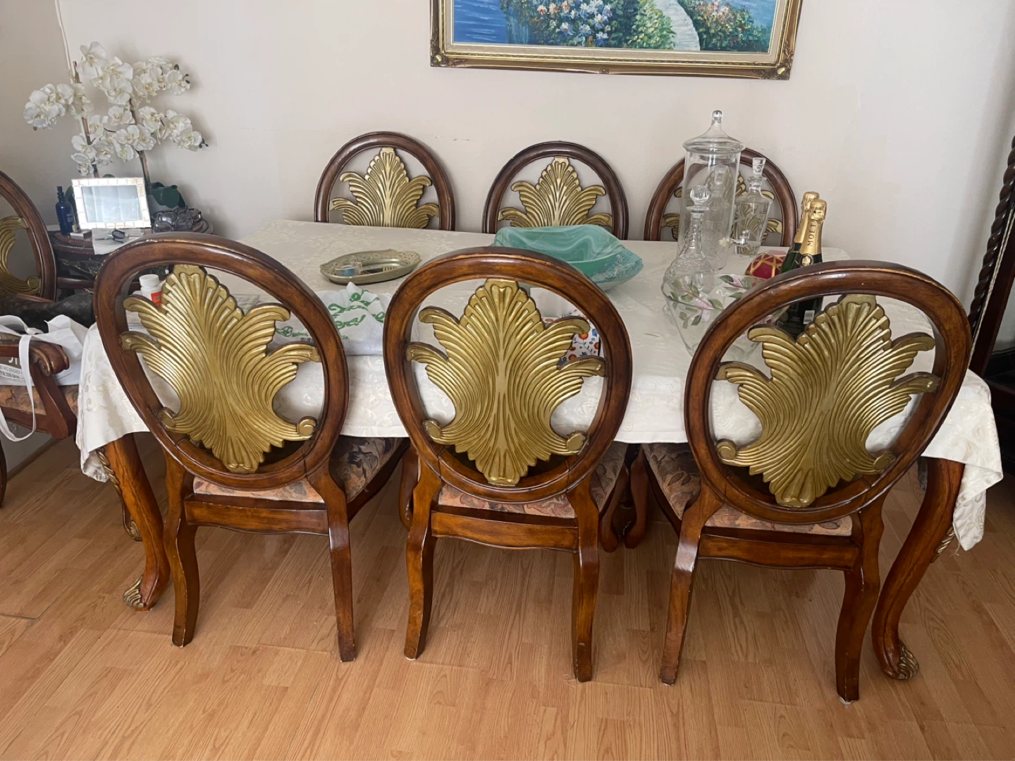 Set of 8 Dining Chairs with Ornate Gold Leaf Backs