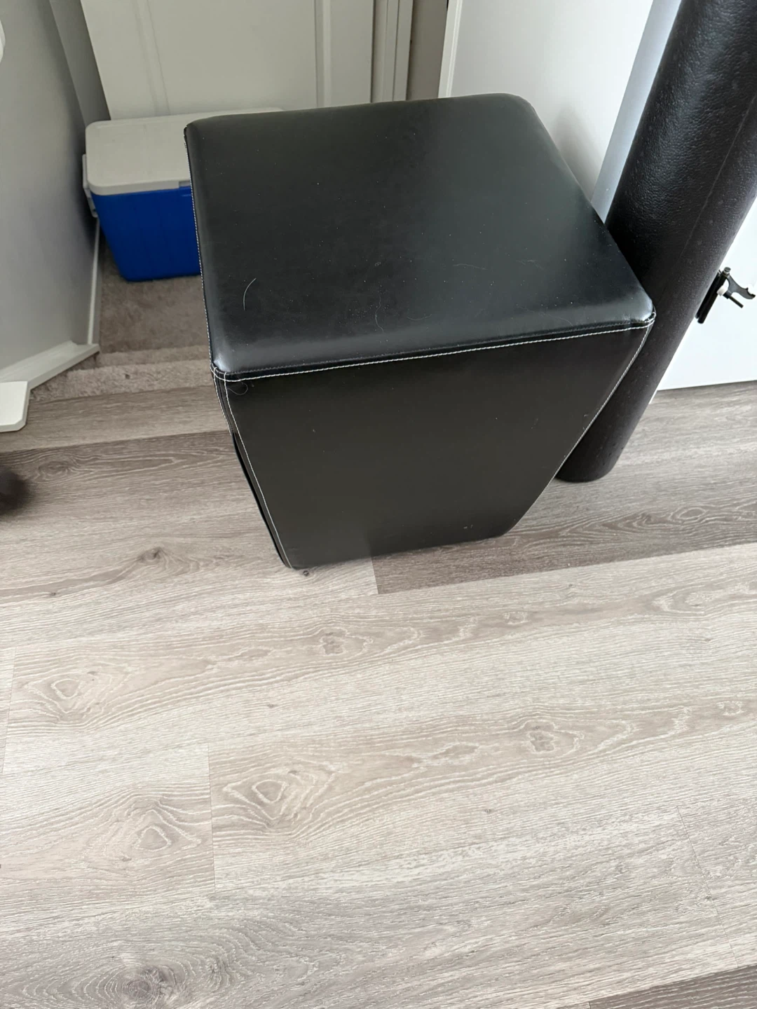 two Black Faux Leather Ottoman