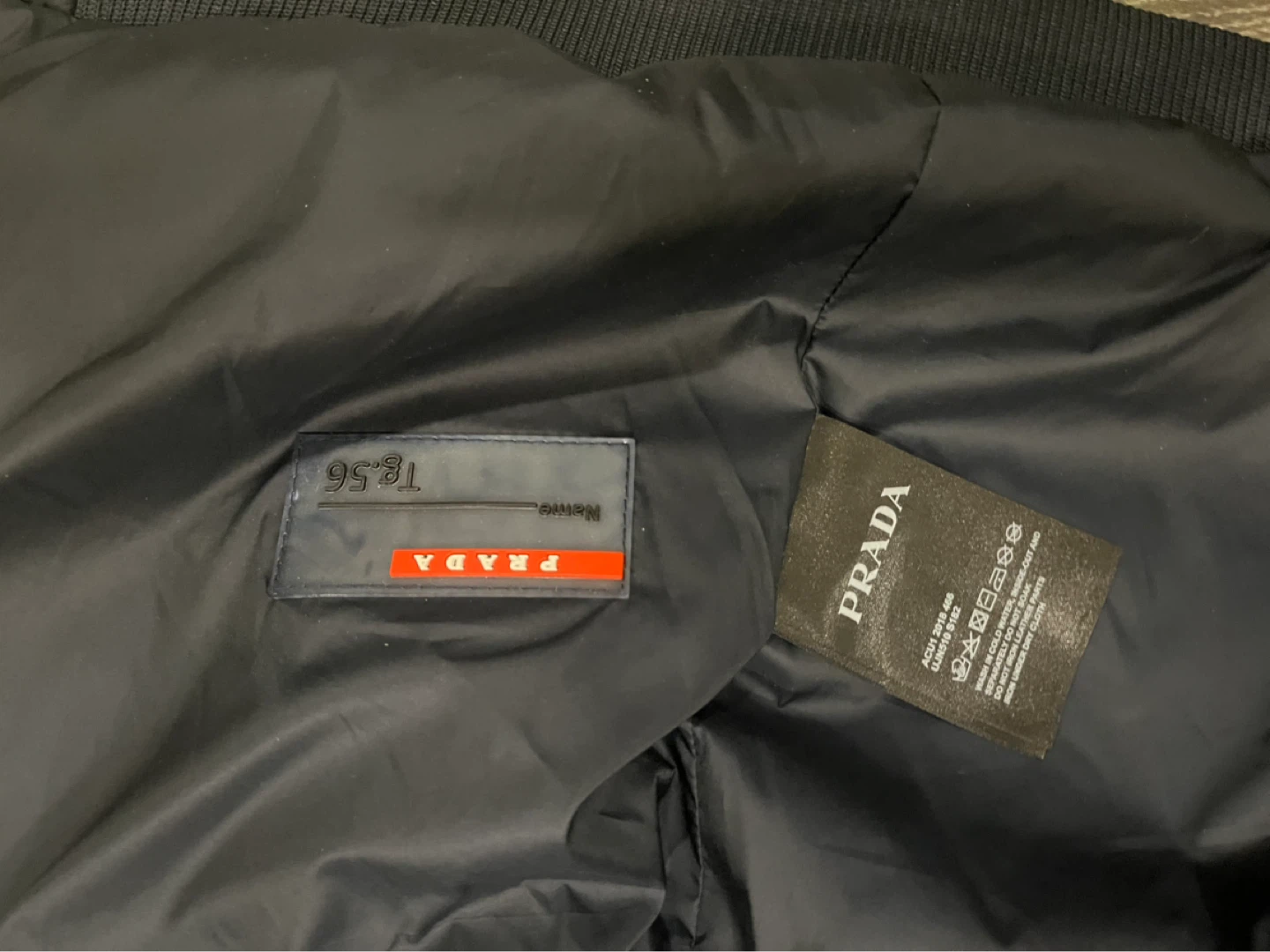 AUTHENTIC Prada Puffer Jacket with Wool Sleeves - photo 5