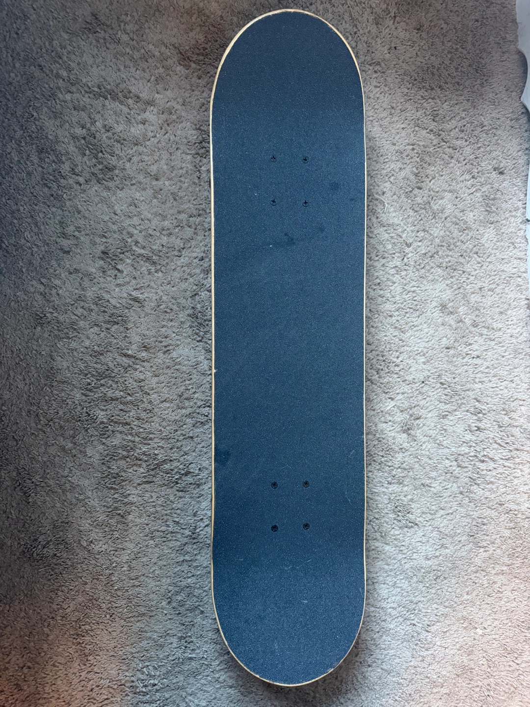 Pink Skateboard with Stickers