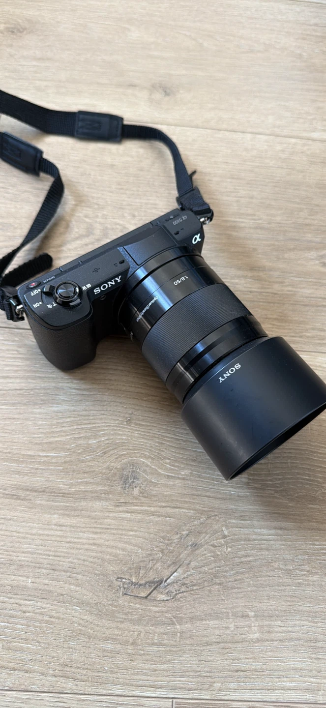 Sony a5100 Mirrorless Camera + Sony E 50mm f/1.8 OSS Lens — $300