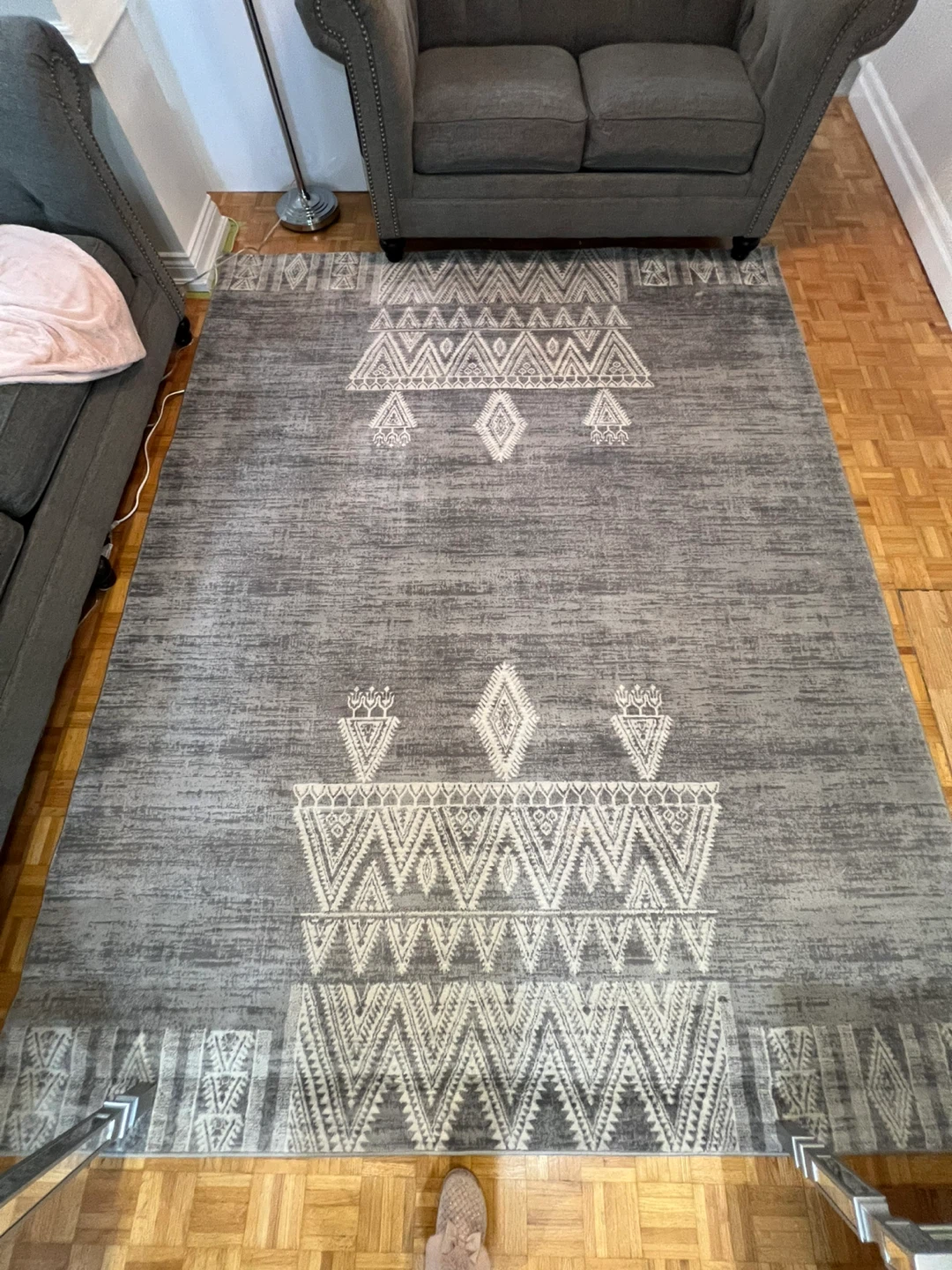 Grey Area Rug with Geometric Pattern