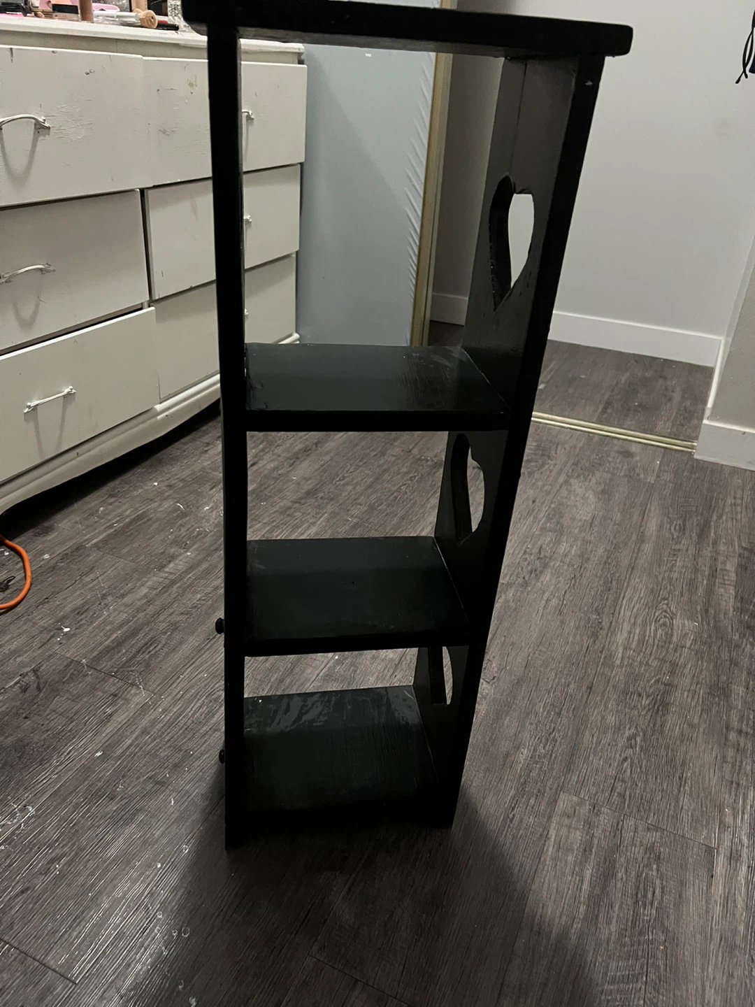 Black Wooden Shelf Unit with Heart Cutouts