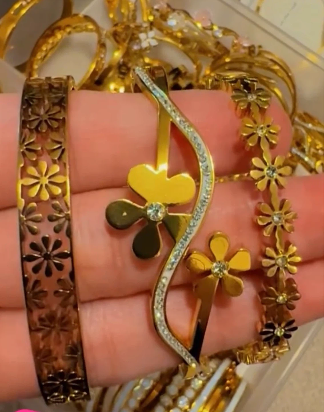 Gold Tone Bangle Bracelets with Floral Design