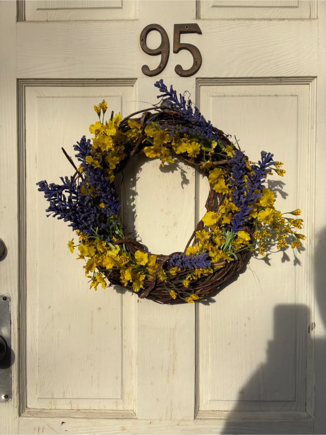 Artificial Flower Wreath with Yellow and Purple Blooms