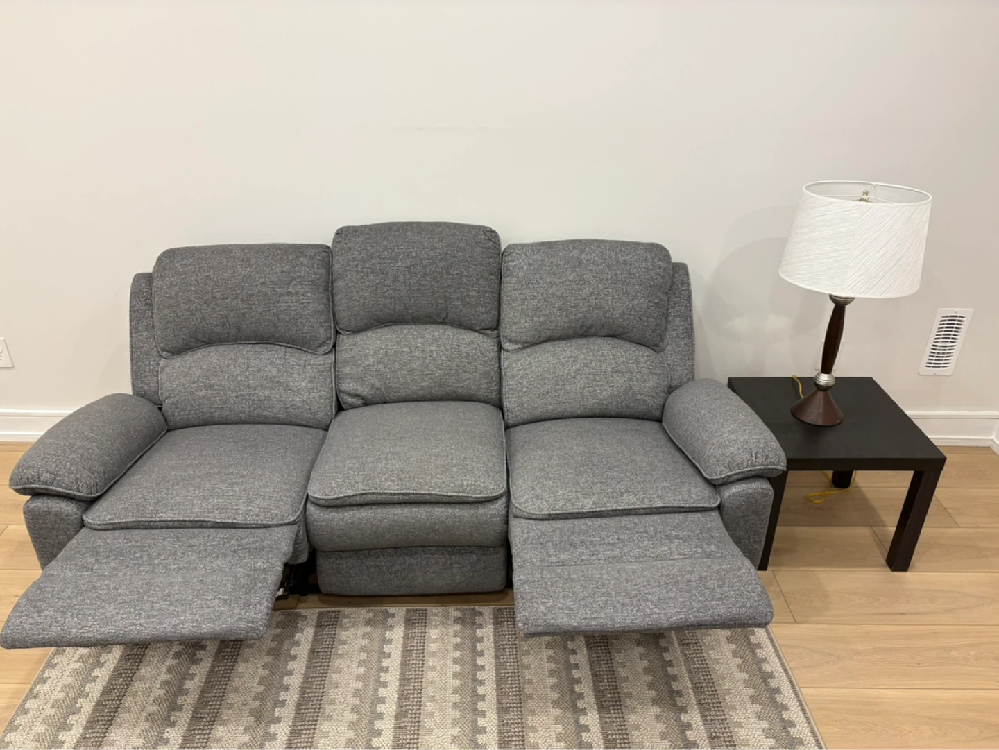 Couch and Striped Area Rug - photo 2