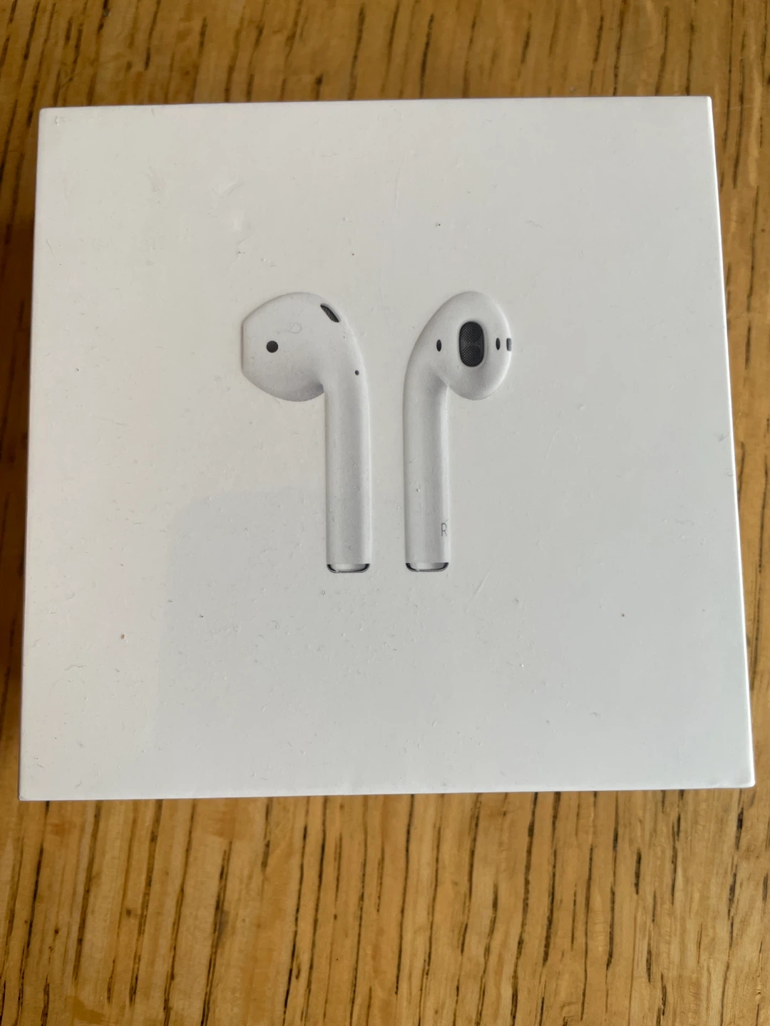 Apple AirPods with Charging Case (2nd Generation)